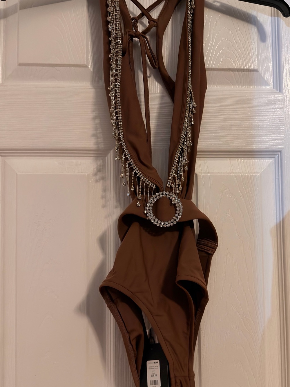 New - Never worn
Fashion Nova Brown One-Piece Swimsuit with Rhinestone Fringe